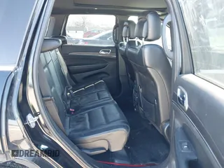 2018 Jeep Grand Cherokee Limited z VIN 1C4RJFBG5JC127845, wystawiony jako IAAI lot #42026704 z przebiegiem 119 948 mil mil oraz . Historia ofert i sprzedaży dostępna na DreamBid. Obrazek 8.