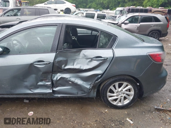 2012 Mazda 3 i Grand Touring with VIN JM1BL1W87C1662837, listed as a IAAI auction lot 42591473 with 76,516 mi miles and . Bid and sale history available at DreamBid. Image 6.