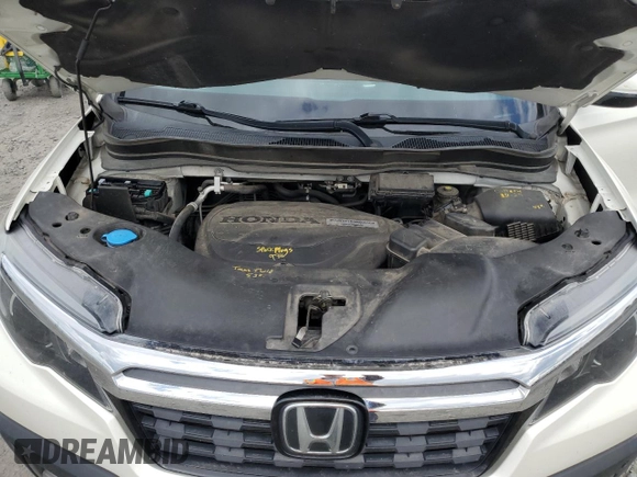 2019 Honda Ridgeline RTL-E with VIN 5FPYK3F74KB039057, listed as a Copart auction lot 57350525 with 105,102 mi miles and Salvage title. Bid and sale history available at DreamBid. Image 11.