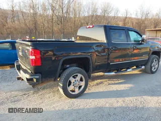 2015 GMC Sierra 2500HD available WiFi SLT with VIN 1GT12ZEG7FF606328, listed as a IAAI auction lot 41793799 with 94,107 mi miles. Bid and sale history available at carsss.com. Image 4.