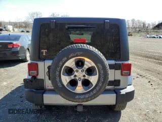 2018 Jeep Wrangler Unlimited Sahara z VIN 1C4BJWEG9JL835996, wystawiony jako Copart lot #51099005 z przebiegiem 42 962 mil mil oraz Szkoda całkowita • Salvage title. Historia ofert i sprzedaży dostępna na DreamBid. Obrazek 6.
