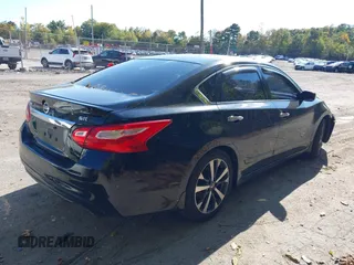2016 Nissan Altima SR with VIN 1N4AL3AP0GC183732, listed as a IAAI auction lot 40519031 with 72,053 mi miles and . Bid and sale history available at carsss.com. Image 4.