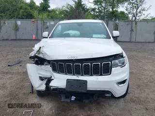 2021 Jeep Grand Cherokee Laredo E with VIN 1C4RJFAG7MC620710, listed as a IAAI auction lot 42255694 with 51,989 mi miles and . Bid and sale history available at DreamBid. Image 13.