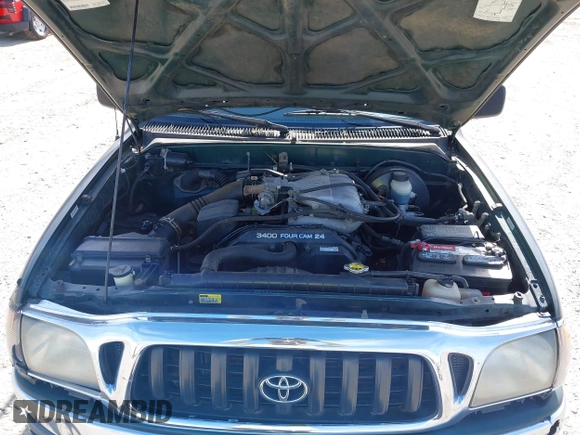 2002 Toyota Tacoma PreRunner z VIN 5TESN92N62Z119262, wystawiony jako IAAI lot #41848612 z przebiegiem 324 700 mil mil oraz . Historia ofert i sprzedaży dostępna na DreamBid. Obrazek 10.