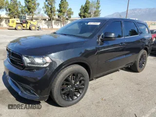 2015 Dodge Durango SXT with VIN 1C4RDHAG4FC931226, listed as a Copart auction lot 64139585 with 128,074 mi miles and Clean title. Bid and sale history available at DreamBid. Image 1.
