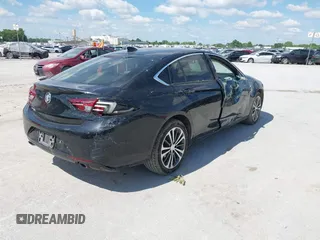 2018 Buick Regal Essence with VIN W04GP6SX5J1120700, listed as a IAAI auction lot 42334588 with 131,926 mi miles and . Bid and sale history available at DreamBid. Image 4.