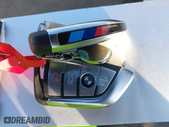 2021 BMW X6 sDrive40i z VIN 5UXCY4C06M9E16162, wystawiony jako IAAI lot #41279040 z przebiegiem 94 494 mil mil oraz . Historia ofert i sprzedaży dostępna na DreamBid. Obrazek 11.