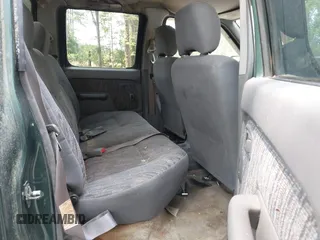 2000 Nissan Frontier XE z VIN 1N6ED27TXYC350670, wystawiony jako IAAI lot #42422277 z przebiegiem 192 897 mil mil oraz . Historia ofert i sprzedaży dostępna na DreamBid. Obrazek 8.