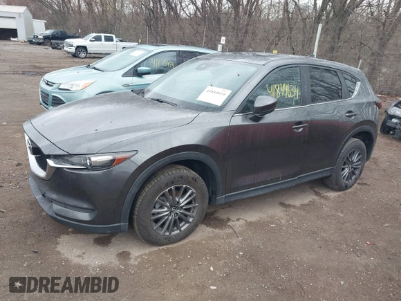 2017 Mazda CX-5 Touring with VIN JM3KFACL3H0148312, listed as a IAAI auction lot 41844634 with 68,534 mi miles and . Bid and sale history available at carsss.com. Image 17.