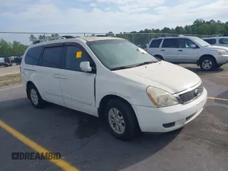 2012 Kia Sedona LX with VIN KNDMG4C7XC6446218, listed as a IAAI auction lot 42083645 with 151,844 mi miles. Bid and sale history available at carsss.com. Image 1.