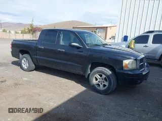 2006 Dodge Dakota SLT with VIN 1D7HE48NX6S596684, listed as a IAAI auction lot 41992956 with 255,526 mi miles and . Bid and sale history available at carsss.com. Image 1.