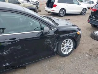 2020 Ford Fusion SE with VIN 3FA6P0LU7LR194413, listed as a IAAI auction lot 38094911 with 43,645 mi miles and . Bid and sale history available at DreamBid. Image 6.
