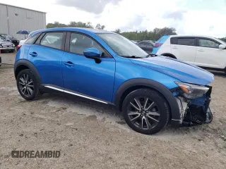 2016 Mazda CX-3 Grand Touring with VIN JM1DKBD72G0106104, listed as a Copart auction lot 52581085 with 76,603 mi miles and Salvage Title. Bid and sale history available at carsss.com. Image 4.