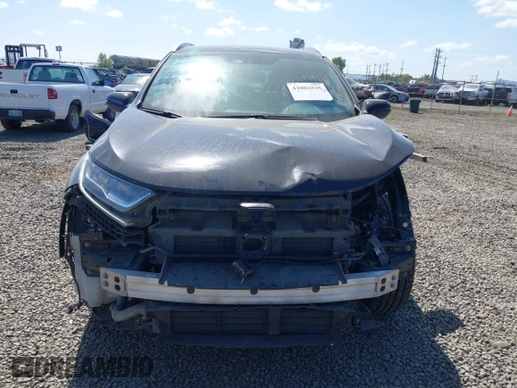 2021 Honda CR-V Touring with VIN 2HKRW2H96MH681908, listed as a IAAI auction lot 42082535 with 65,570 mi miles and . Bid and sale history available at DreamBid. Image 13.
