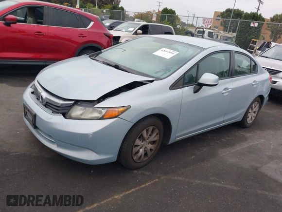 2012 Honda Civic LX with VIN 2HGFB2F58CH560126, listed as a IAAI auction lot 42097094 with 149,921 mi miles and . Bid and sale history available at DreamBid. Image 17.