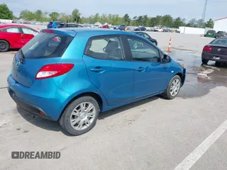 2012 Mazda 2 Sport z VIN JM1DE1KY5C0149990, wystawiony jako IAAI lot #42177069 z przebiegiem 85 371 mil mil oraz . Historia ofert i sprzedaży dostępna na DreamBid. Obrazek 4.