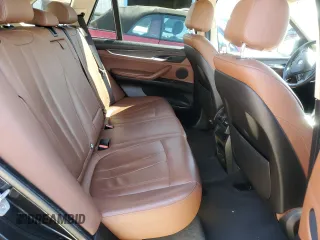 2014 BMW X5 xDrive35i with VIN 5UXKR0C51E0K51458, listed as a Copart auction lot 48675285 with 125,553 mi miles and Salvage Title. Bid and sale history available at carsss.com. Image 11.