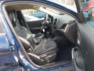 2018 Jeep Cherokee Limited with VIN 1C4PJMDB5JD562002, listed as a IAAI auction lot 41806090 with 116,706 mi miles. Bid and sale history available at carsss.com. Image 5.