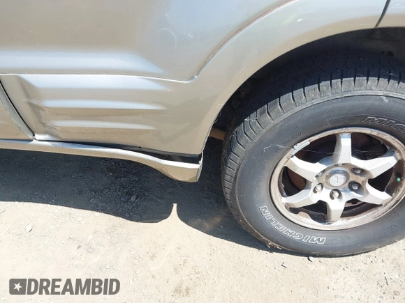 2002 Mitsubishi Montero Limited z VIN JA4MW51R32J038369, wystawiony jako IAAI lot #42309558 z przebiegiem 176 258 mil mil oraz . Historia ofert i sprzedaży dostępna na DreamBid. Obrazek 6.