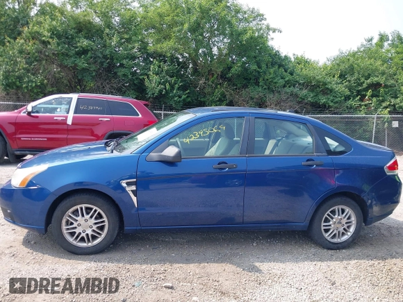 2008 Ford Focus SE z VIN 1FAHP35N48W230014, wystawiony jako IAAI lot #42395069 z przebiegiem 140 179 mil mil oraz . Historia ofert i sprzedaży dostępna na DreamBid. Obrazek 14.