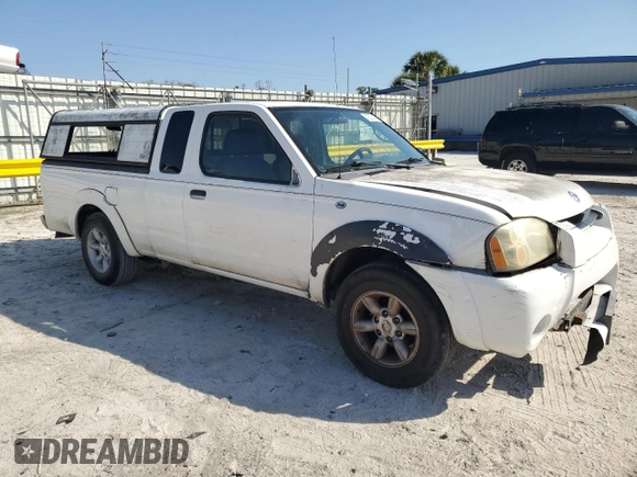 2004 Nissan Frontier XE with VIN 1N6DD26T04C450297, listed as a Copart auction lot 47326415 with 220,266 mi miles and Salvage title. Bid and sale history available at DreamBid. Image 4.