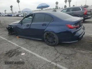 2022 BMW M3 Competition xDrive with VIN WBS43AY00NFM14007, listed as a Copart auction lot 62390405 with 20,668 mi miles and Salvage title. Bid and sale history available at DreamBid. Image 2.
