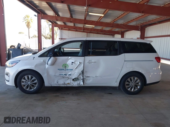 2021 Kia Sedona LX with VIN KNDMB5C15M6669588, listed as a IAAI auction lot 41757129 with 14,738 mi miles. Bid and sale history available at carsss.com. Image 14.