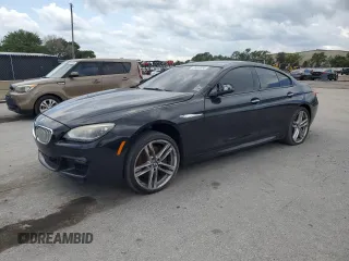 2015 BMW 6 Series 650i z VIN WBA6B2C5XFD130082, wystawiony jako Copart lot #58449885 z przebiegiem Nie podano mil oraz Czysty tytuł • Clean title. Historia ofert i sprzedaży dostępna na DreamBid. Obrazek 1.