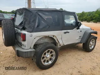 2009 Jeep Wrangler X with VIN 1J4FA24159L730840, listed as a Copart auction lot 56278745 with 95,851 mi miles and Salvage title. Bid and sale history available at DreamBid. Image 3.