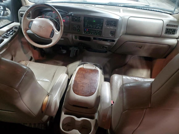 2002 Ford Excursion Limited z VIN 1FMNU43S22EB80551, wystawiony jako Copart lot #44629455 z przebiegiem 182 013 mil mil oraz Szkoda całkowita • Salvage title. Historia ofert i sprzedaży dostępna na DreamBid. Obrazek 8.