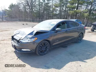2018 Ford Fusion SE z VIN 3FA6P0LU6JR118226, wystawiony jako IAAI lot #41811406 z przebiegiem 165 352 mil mil oraz . Historia ofert i sprzedaży dostępna na DreamBid. Obrazek 21.