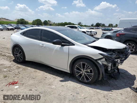 2024 Toyota Prius LE with VIN JTDACAAU5R3031775, listed as a Copart auction lot 52430075 with 9,957 mi miles and Non Repairable. Bid and sale history available at DreamBid. Image 4.