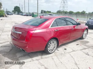 2015 Cadillac CTS Luxury AWD with VIN 1G6AX5SX2F0112852, listed as a IAAI auction lot 42398611 with 70,253 mi miles and . Bid and sale history available at DreamBid. Image 4.