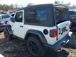 2021 Jeep Wrangler Sport S with VIN 1C4HJXAG0MW757133, listed as a IAAI auction lot 41028980 with 53,165 mi miles and . Bid and sale history available at DreamBid. Image 3.