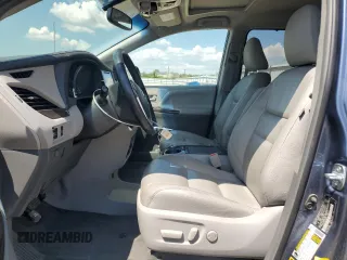 2015 Toyota Sienna XLE with VIN 5TDYK3DC4FS619385, listed as a Copart auction lot 57090385 with 112,896 mi miles and Salvage title. Bid and sale history available at DreamBid. Image 7.