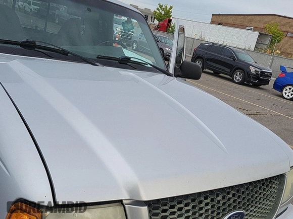 2002 Ford Ranger XL Fleet with VIN 1FTZR45E52PB30794, listed as a IAAI auction lot 42118623 with 167,724 mi miles. Bid and sale history available at carsss.com. Image 1.