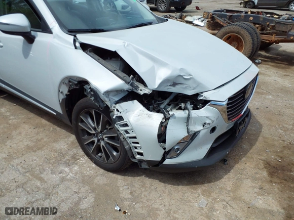 2017 Mazda CX-3 Grand Touring with VIN JM1DKFD78H0160564, listed as a IAAI auction lot 39236942 with 50,921 mi miles. Bid and sale history available at carsss.com. Image 6.
