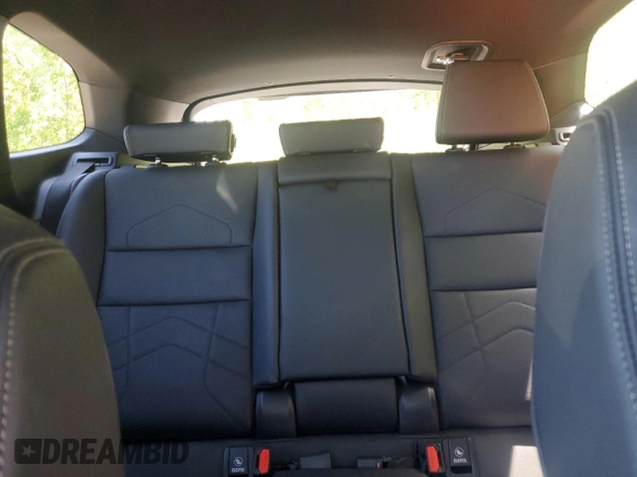 2023 BMW X1 xDrive28i with VIN WBX73EF04P5X86962, listed as a Copart auction lot 57575815 with 95,965 mi miles and Salvage title. Bid and sale history available at DreamBid. Image 10.