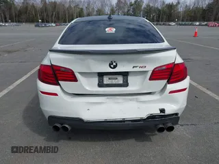 2013 BMW 5 Series 535i xDrive with VIN WBAFU7C51DDU68586, listed as a IAAI auction lot 41939159 with 111,496 mi miles and . Bid and sale history available at carsss.com. Image 6.