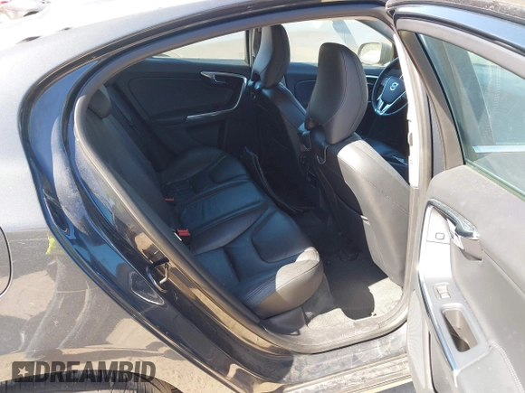 2013 Volvo S60 T5 Premier z VIN YV1612FSXD2176182, wystawiony jako IAAI lot #42238470 z przebiegiem 128 084 mil mil oraz . Historia ofert i sprzedaży dostępna na DreamBid. Obrazek 8.