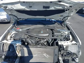 2018 BMW 3 Series 330i xDrive with VIN WBA8Z9C5XJG828406, listed as a IAAI auction lot 41236150 with 36,815 mi miles. Bid and sale history available at carsss.com. Image 10.