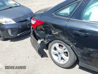 2014 Ford Focus SE with VIN 1FADP3F2XEL120830, listed as a IAAI auction lot 42082905 with 19,128 mi miles and . Bid and sale history available at DreamBid. Image 6.
