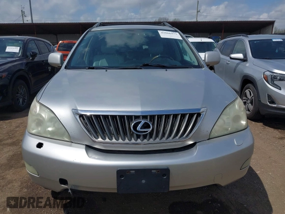 2008 Lexus RX with VIN 2T2HK31U58C053306, listed as a IAAI auction lot 42066973 with 184,266 mi miles. Bid and sale history available at carsss.com. Image 12.