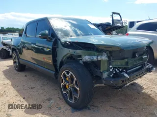 2023 Rivian R1T Adventure z VIN 7FCTGAAAXPN019894, wystawiony jako IAAI lot #42168226 z przebiegiem 23 380 mil mil oraz . Historia ofert i sprzedaży dostępna na DreamBid. Obrazek 1.