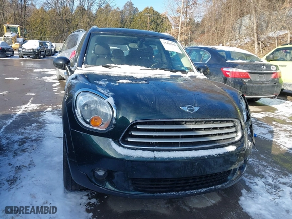 2013 MINI Cooper Countryman with VIN WMWZB3C53DWM08700, listed as a IAAI auction lot 41402093 with 71,109 mi miles. Bid and sale history available at carsss.com. Image 13.