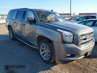 2019 GMC Yukon XL SLT with VIN 1GKS2GKC0KR137672, listed as a IAAI auction lot 41293745 with 104,141 mi miles and . Bid and sale history available at carsss.com. Image 1.