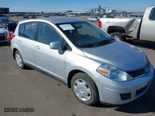 2009 Nissan Versa 1.8 S with VIN 3N1BC13E09L502085, listed as a IAAI auction lot 41869799 with 104,078 mi miles. Bid and sale history available at carsss.com. Image 1.