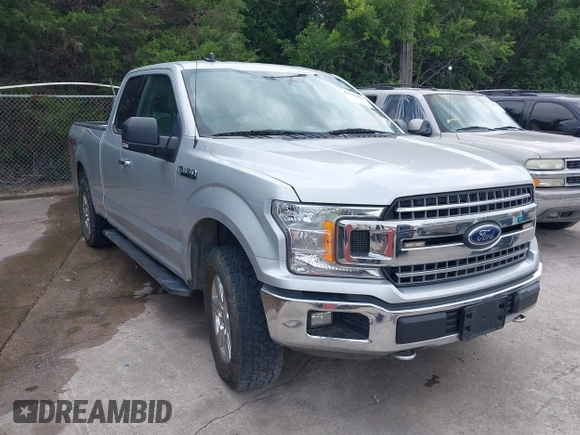 2019 Ford F-150 XL with VIN 1FTFX1E59KKC12581, listed as a IAAI auction lot 42534086 with 152,955 mi miles and . Bid and sale history available at DreamBid. Image 1.