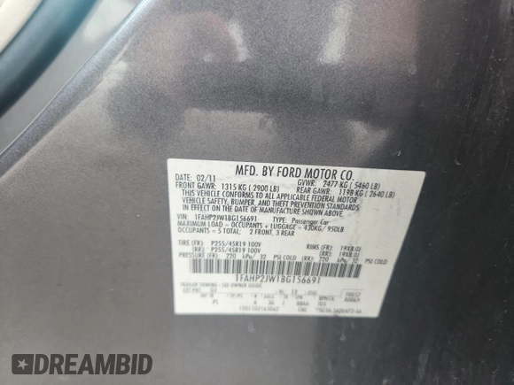2011 Ford Taurus Limited z VIN 1FAHP2JW1BG156691, wystawiony jako Copart lot #59811755 z przebiegiem 162 828 mil mil oraz Szkoda całkowita • Salvage title. Historia ofert i sprzedaży dostępna na DreamBid. Obrazek 12.