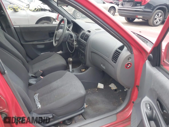 2005 Hyundai Accent GLS with VIN KMHCG45CX5U614083, listed as a IAAI auction lot 41006582 with 72,516 mi miles. Bid and sale history available at carsss.com. Image 5.
